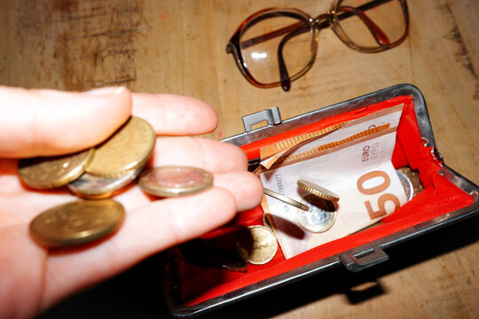 Money, Euro. Hand Holds Coins Wallet With Cash Inside