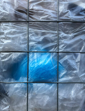 plastic behind fence