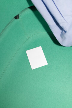 Blank Note on Green Leather Surface