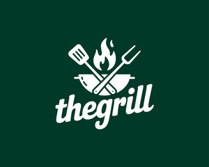 Obraz premium A logo for a grill restaurant with a spatula, fork, and flame design on a dark green background