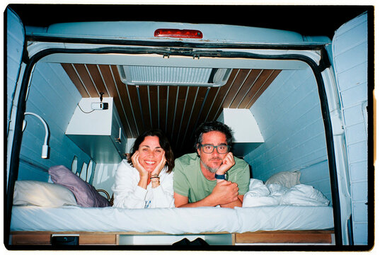 Couple posing in Camper Van