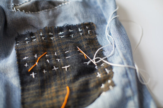 Hand Stitched Sashiko Fabric Repair on Denim Jeans