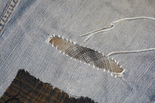 Hand Stitched Sashiko Fabric Repair on Denim Jeans