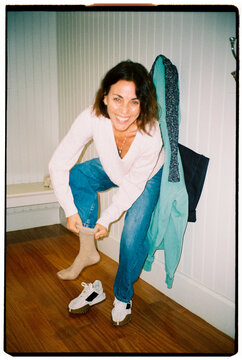 Unfocused Woman Trying on Clothes