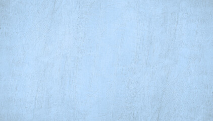 Light blue white concrete cement wall grungy surface texture background. Pale soft muted pastel...