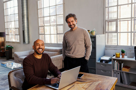 Business team collaborating in creative modern office