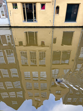 houses reflected in water