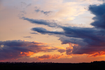 Obraz premium Dramatic sky with beautiful colors after the sunset.