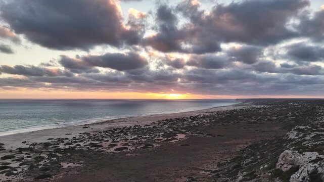 Great Australian Bight - Scenic Lookout, Nullarbor Plain, South Australia &ndash; 4K aerial drone footage of dramatic coastal cliffs, turquoise ocean and rugged wilderness at sunset