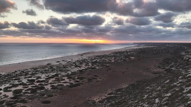 Great Australian Bight - Scenic Lookout, Nullarbor Plain, South Australia &ndash; 4K aerial drone footage of dramatic coastal cliffs, turquoise ocean and rugged wilderness at sunset