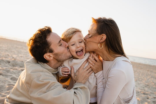 Happy family on the beach.