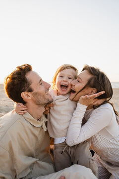 Happy family on the beach.