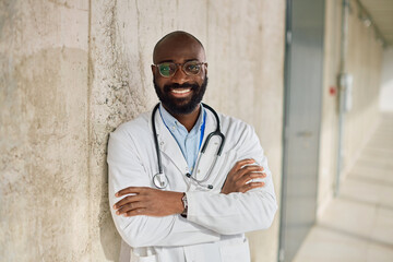 Confident black medical expert at the hospital looking at camera.