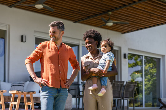 Family enjoying time on a sunny patio