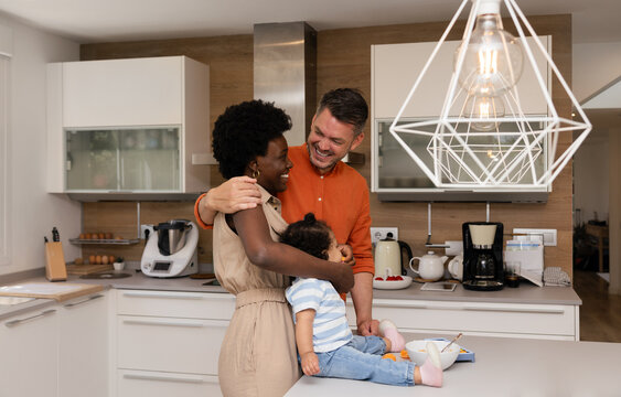 Family enjoying quality time in modern kitchen