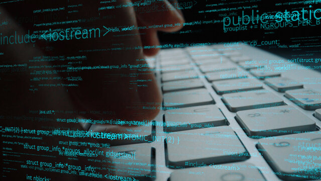 A close-up image shows hands typing on a keyboard with abstract code and data projected in the background. This visual represents technology and programming creativity. Xenic