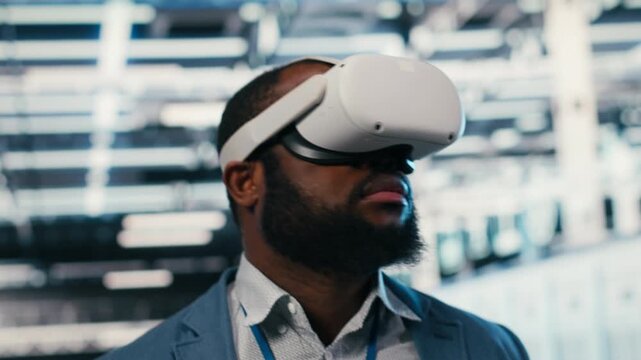 Portrait of smiling man in data center putting VR headset on to optimize electronics. Cheerful server hub system administrator using virtual reality simulation to monitor system performance, camera B