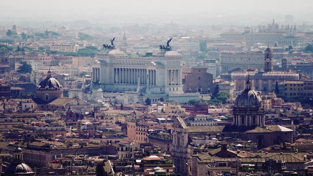 Aerial panoramic drone shot of best landmarks in Rome, Italy, Altar of Fatherland, Colosseum, Roman Forum, church Sant'Agnese in Agone, Campidoglio