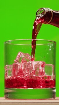 Vermouth Negroni, spanish wine drink, Alcoholic Americano Cocktail bitter, sweet vermouth and soda water, close up of making drink, summer spanish vacations. 