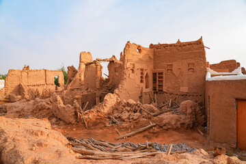 Crumbling mud brick ruins of an ancient building in the historic village of Shaqra, Saudi Arabia
