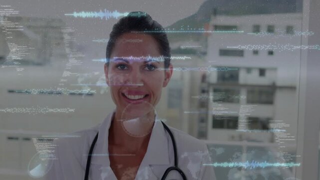 Doctor wearing coat and smiling while camera zooming out, HUD data appearing showing medical data