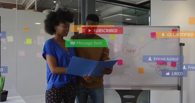 Business duo reviewing blue folder collaborating opening causing alerts over board, then receding