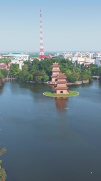 Aerial view of tHoa Lu Old town, Ninh Binh, Vietnam, a popular tourist destination, on a sunny day . The temple is a place of worship and a symbol of Vietnamese culture.
