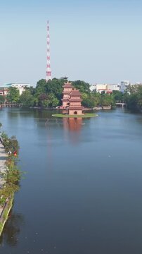 Aerial view of tHoa Lu Old town, Ninh Binh, Vietnam, a popular tourist destination, on a sunny day . The temple is a place of worship and a symbol of Vietnamese culture.
