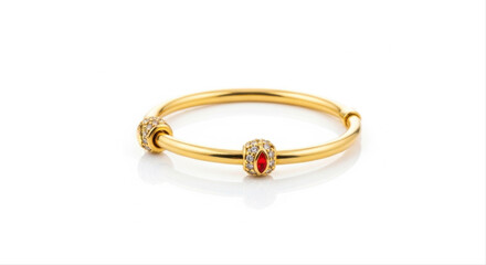 Elegant gold charm bangle with red gemstone and diamond accents, beautifully isolated on a white background