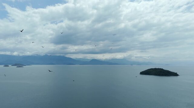A Calm, Island-dotted Bay Stretches Beneath Cloudy Skies in Paraty, Brazil - Wide Shot