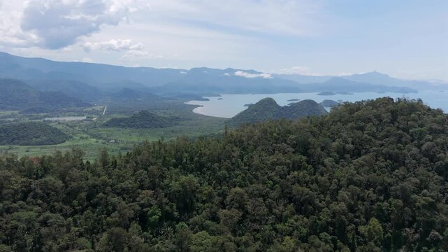 Forested Hills Overlook a Calm Bay in Paraty, Brazil - Aerial Pullback Shot