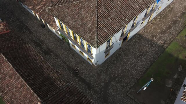 Above Colonial Architecture In Paraty, State of Rio de Janeiro, Brazil, South America. Aerial Ascending Shot