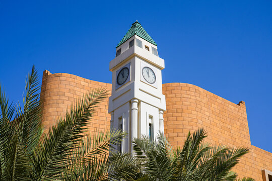 The Al Safat Clock Tower with green tiled roof and arabic numerals near Deera Square in Central Riyadh, Saudi Arabia