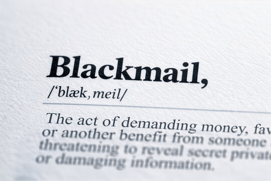 Blackmail Word in Dictionary Close Up