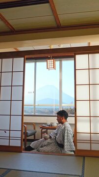Peaceful morning in a ryokan with Mount Fuji in the background