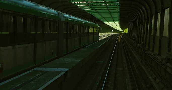 The dynamic beauty of the Taichung MRT as it weaves through the modern city emphasizes the convenience and speed of transportation through the sense of extension of tunnels and tracks.