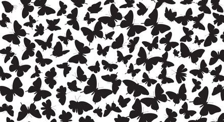 Fototapeta premium A swarm of black butterflies on a white background