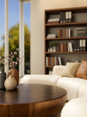 Flower vases on round wooden table and white sofa couch across bookshelf and window in a living room © bongkarn