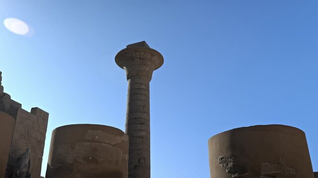 Located in the First Court of the Karnak Temple Complex in Luxor, Egypt, this clip features the last standing column of the Kiosk of Taharqa.