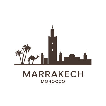 Silhouette of marrakech cityscape featuring a minaret palms and camel