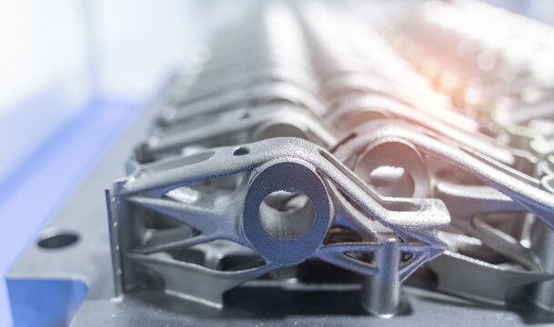 Metal robot hip component products made by metal 3D printing. Modern additive technology.