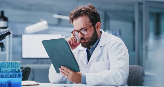 Thinking, science and man on tablet in lab for online research, medical review and experiment results. Healthcare, pharmaceutical and person on digital tech for clinical study, analysis and vaccine
