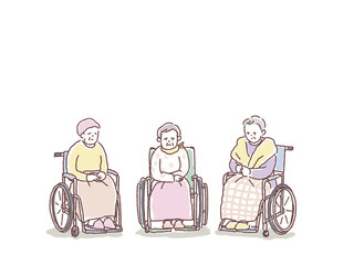 車椅子に乗った悲しい顔の高齢女性