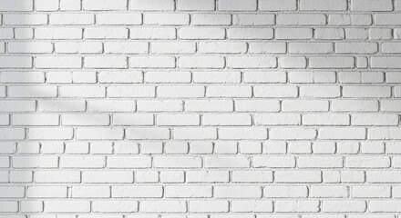 Gray painted brick wall background with subtle shadows and texture urban architectural surface