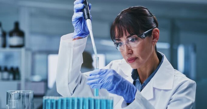 Science, research and woman in lab, test tube for experiment and solution for vaccine. Scientist, equipment or mature person in workplace, medical info and study for pharmaceutical sample and biotech