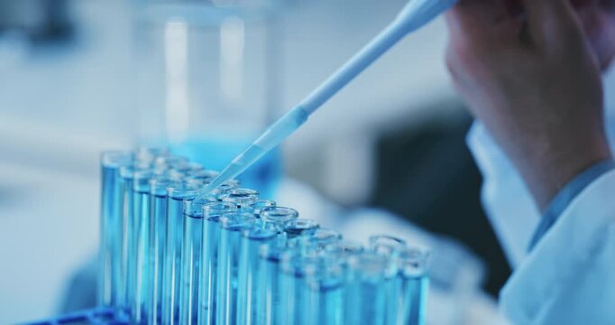 Doctor, hands or neon with tube or vial for chemical testing, clinic trial or cure in laboratory. Closeup, scientist or experiment with liquid syringe for medical research or development in hospital