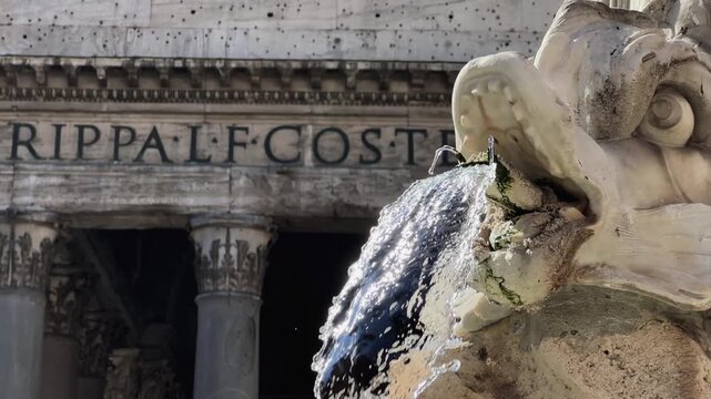 Pantheon in Rome, Italy: view fountain and the exterior with the colonnaded portico. The inscription "M.AGRIPPA.LFCOS.TERTIVM.FECIT" means "Marcus Agrippa, son of Lucius