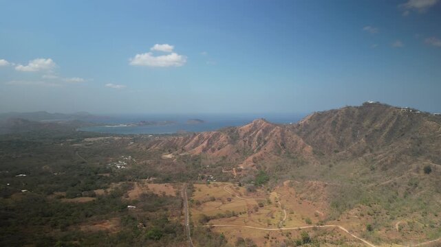 Aerial view of Pacific Ocean from Nuevo Colon Costa Rica dry hillsides in dry season