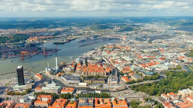 Gothenburg, Sweden. River Gota Alv and Rosenlund Canal. Panoramic view of the central part of the city. Summer day. Cloudy weather. Drone footage