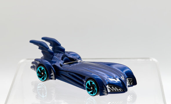 Bologna - Italy - February 24, 2026: Die-cast Hot Wheels Batmobile model from Batman and Robin movie isolated on white background.